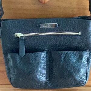 Cole Haan Pebbled leather purse with adjustable handle.